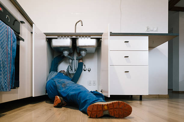 Professional Drain Cleaning technician working in Theresa, NY